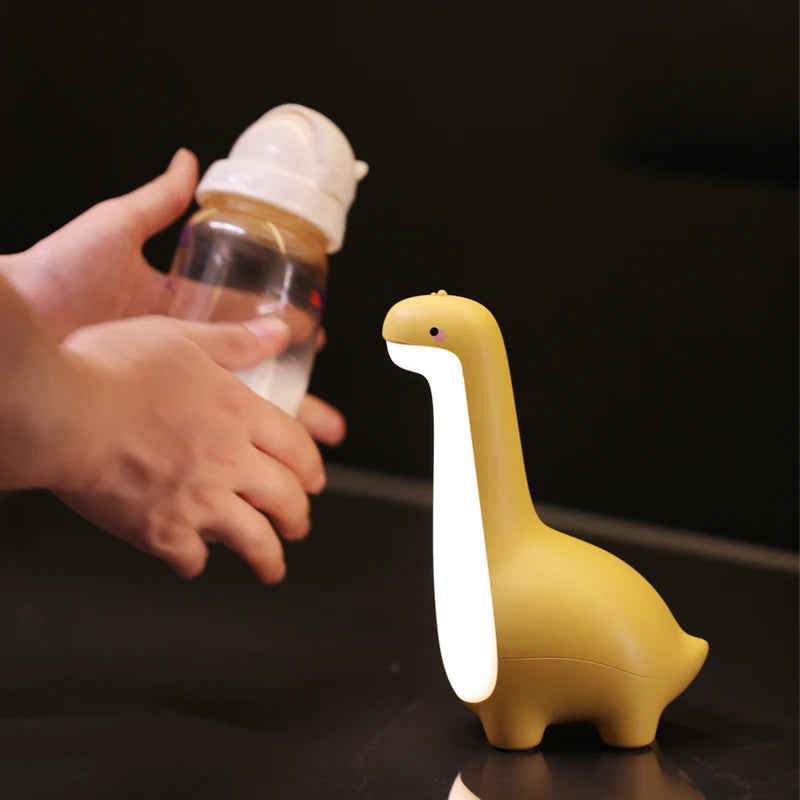 bebe veilleuse lumosaurus utile pour soin nocturne
