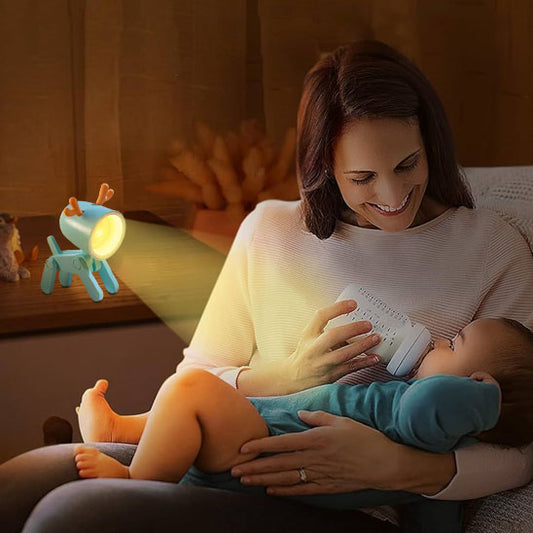 veilleuse bebe lumibot éclairant maman qui nourrit bébé la nuit